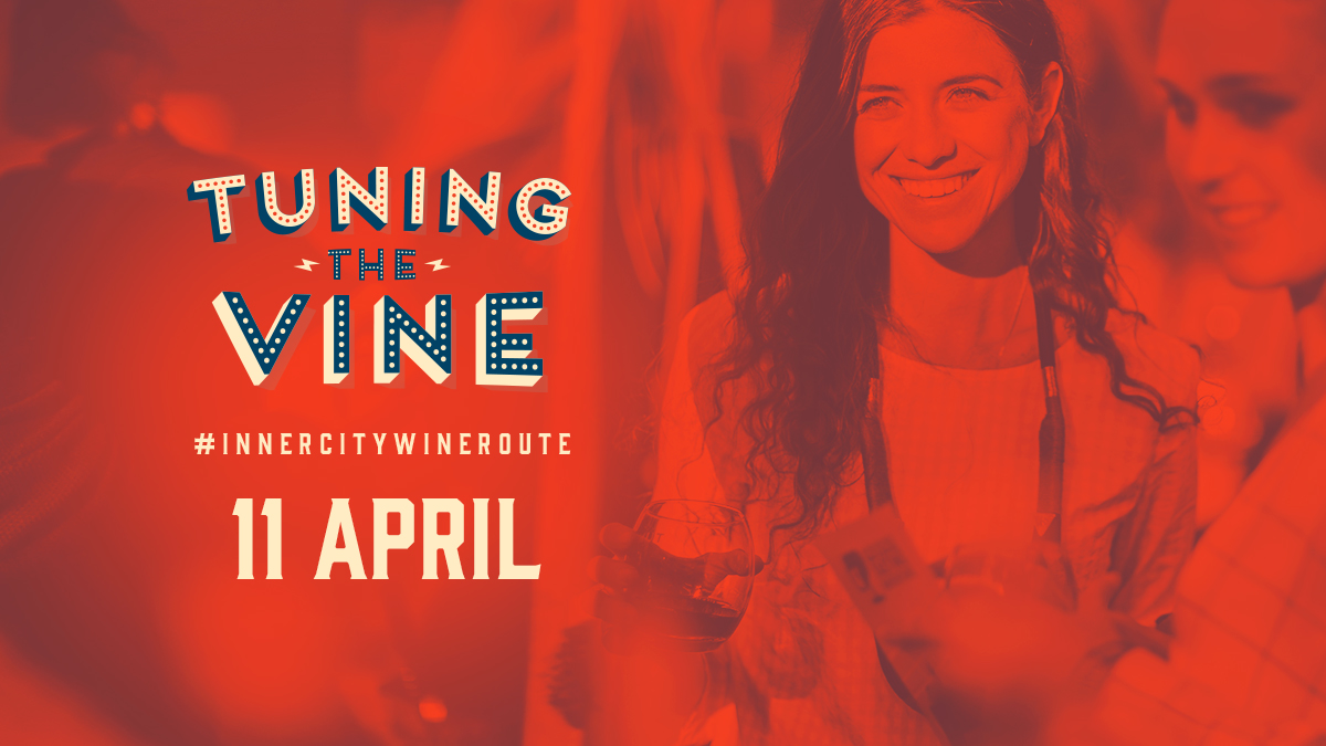 Promotional poster for 'Tuning the Vine' wine event with vibrant red overlay, featuring a happy woman holding a wine glass.